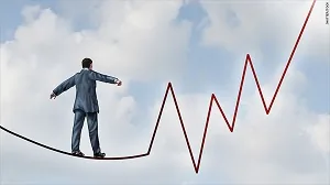 Executivo em corda bamba sobre gráfico de variações técnica gerenciamento risco mercado